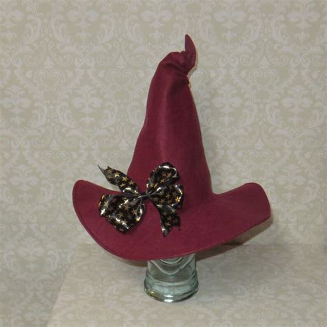 The Art of Witchcraft: Jet and Burgundy Witch Hats as a Statement